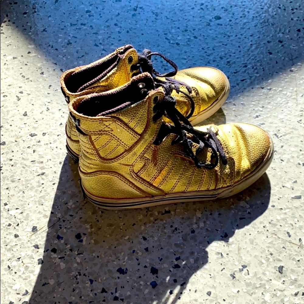 Gold high top tennis shoes